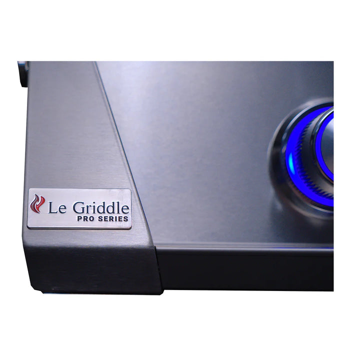 Stono Outdoor Living Close-up of the Le Griddle Pro Series 40 - 1 Burner Natural Gas griddle, featuring a stainless steel finish, Le Griddle branding on the left, blue-lit control knob, and sleek design with interior lights.